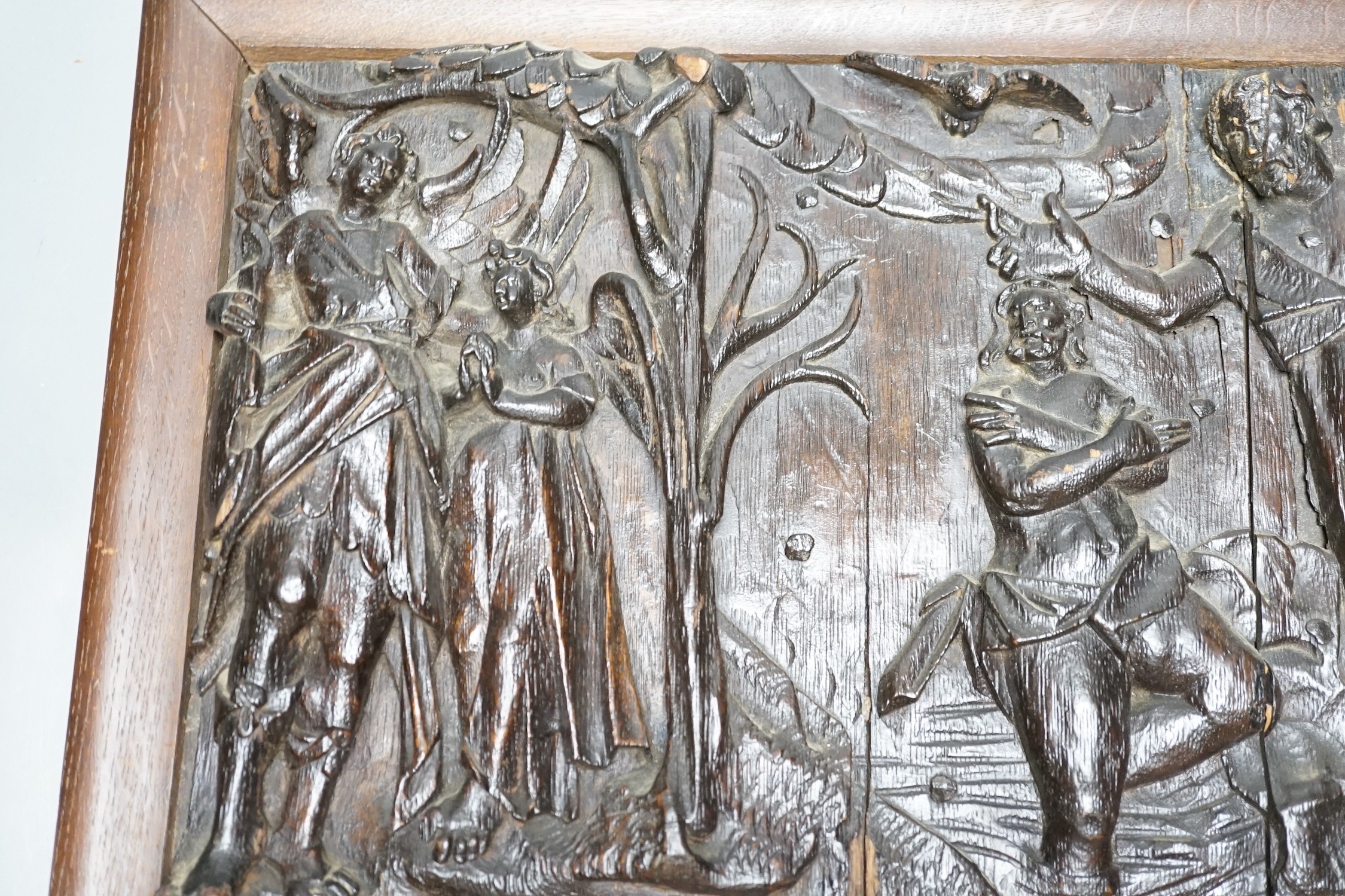 An antique rectangular carved oak panel, later frame, 25x40cm excl frame